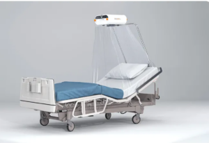 Hospital isolation bed with an integrated protective canopy system, featuring a clear plastic enclosure suspended above an adjustable patient bed with pillow and blanket on a plain grey background